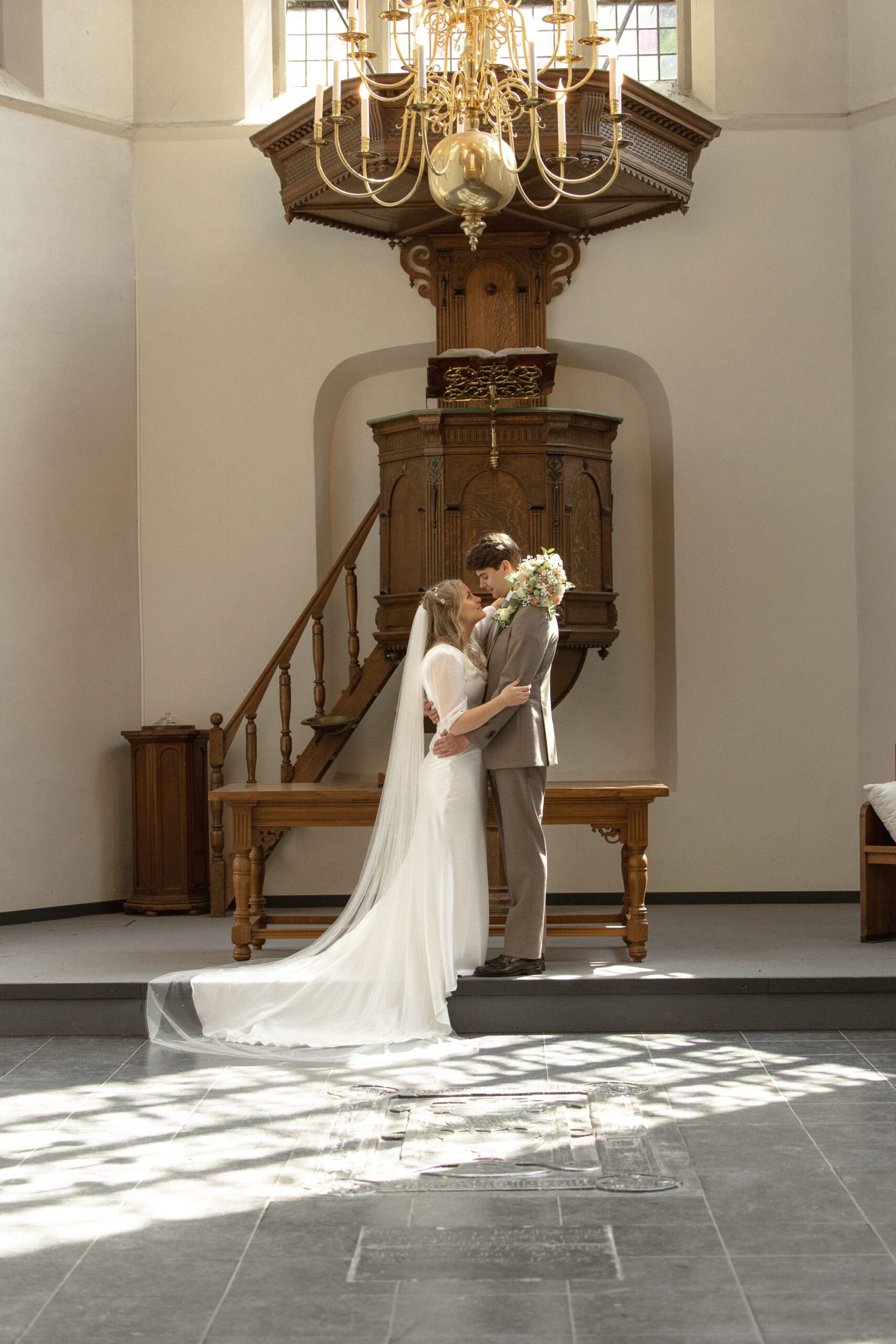Bride and Groom at Oude Kerk Dongen after the ceremony